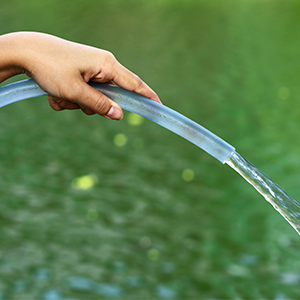 Fig. 1, Blood flow that is not restricted is like water freely running out of a hose.